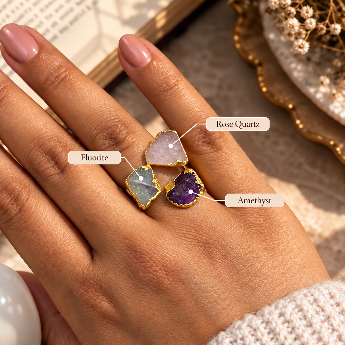 Aarohi raw crystal trio statement ring featuring pale pink Rose Quartz, blue-green Fluorite, and deep purple Amethyst in gold-tone settings by House of AAKAASHI.