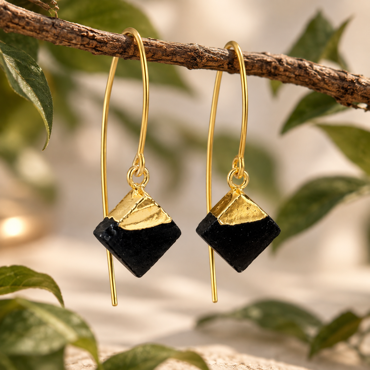 Kaalini Black Tourmaline thread earrings with polished geometric gemstones and triangular 18K gold-plated brass detailing by House of AAKAASHI