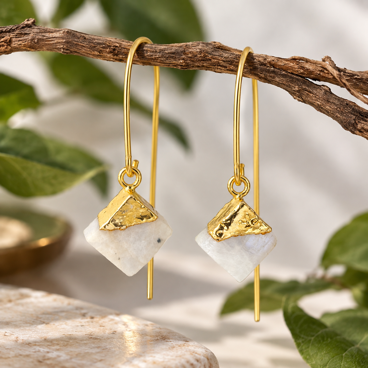 Ishira Rainbow Moonstone thread earrings with polished geometric gemstones and triangular 18K gold-plated brass detailing by House of AAKAASHI