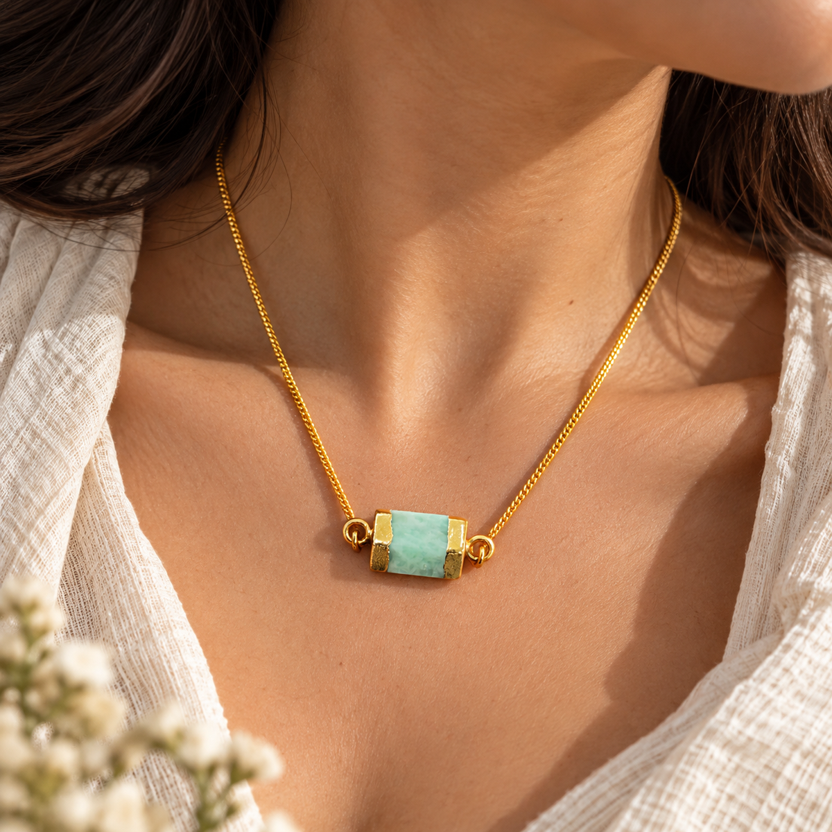 Vanya raw Amazonite pendant necklace featuring a rectangular aqua-green natural gemstone on a delicate gold-tone chain by House of AAKAASHI.