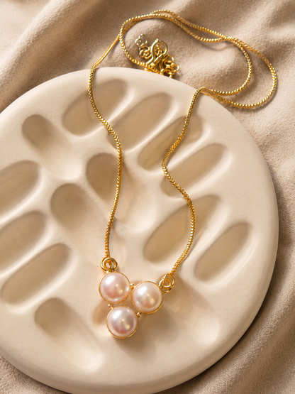 Eternal Pearl Cluster Necklace featuring three natural freshwater pearls on an 18K gold plated brass chain by House of AAKAASHI